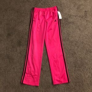 Hot pink adidas pants with black detail